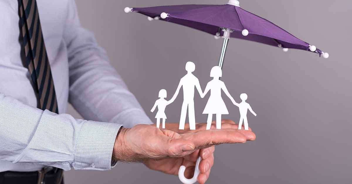 Man holding umbrella protecting family 534204448(1200x628)